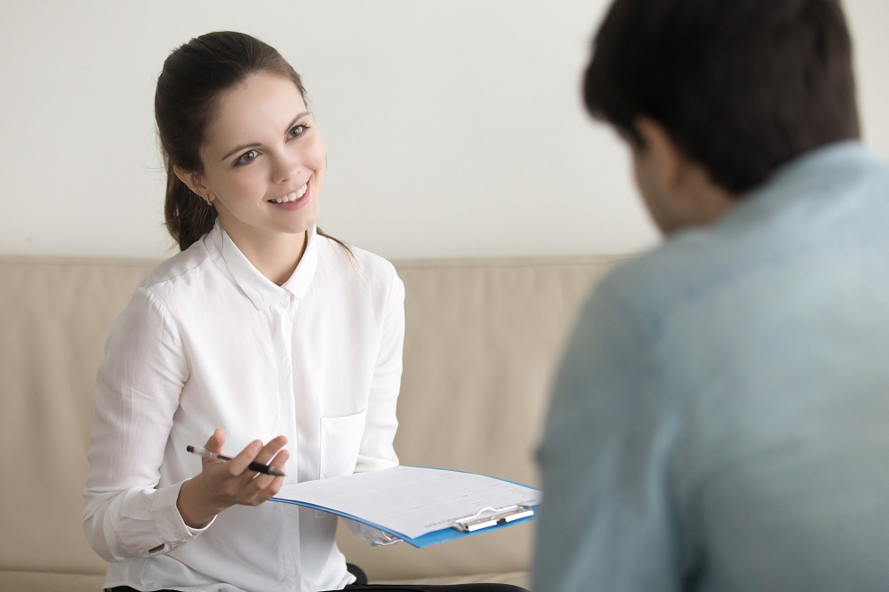 a woman talking to a client