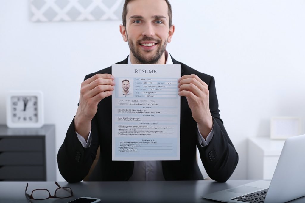 Man showing his resume