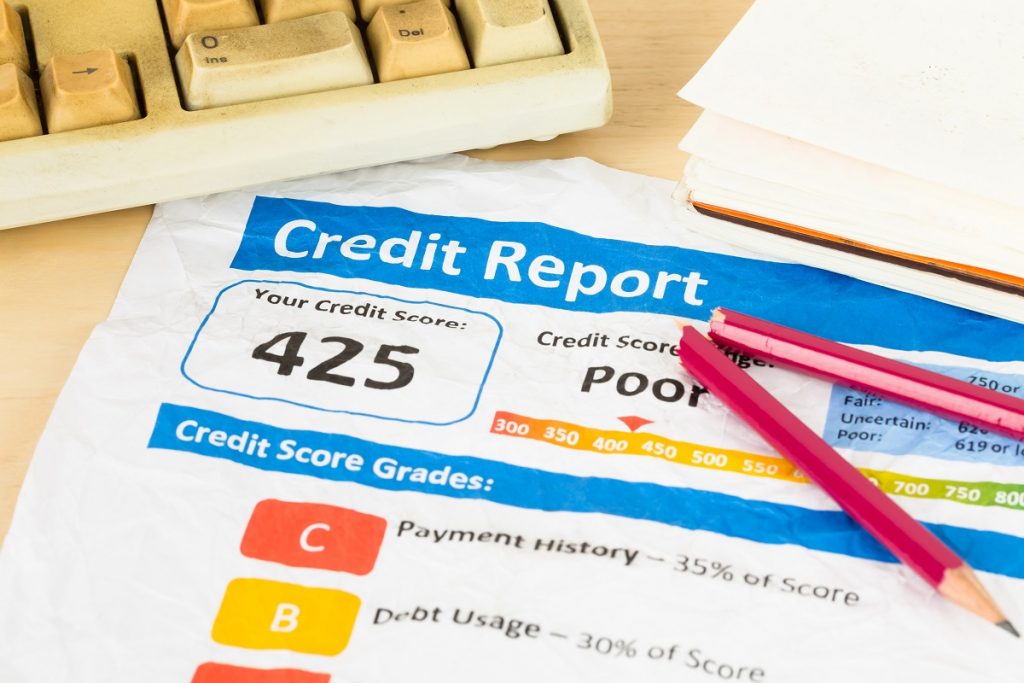 crumpled credit report document