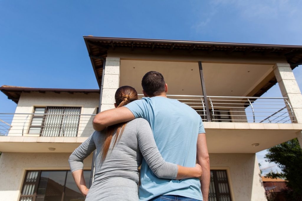 Couple thinking about buying the house