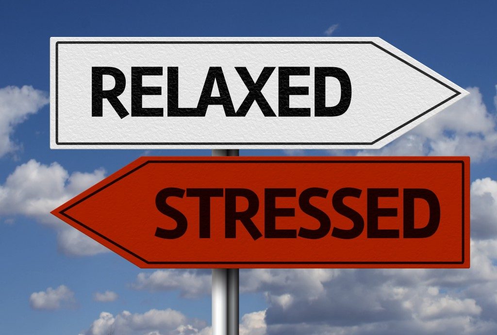 Creative sign with the text - Relaxed x Stressed