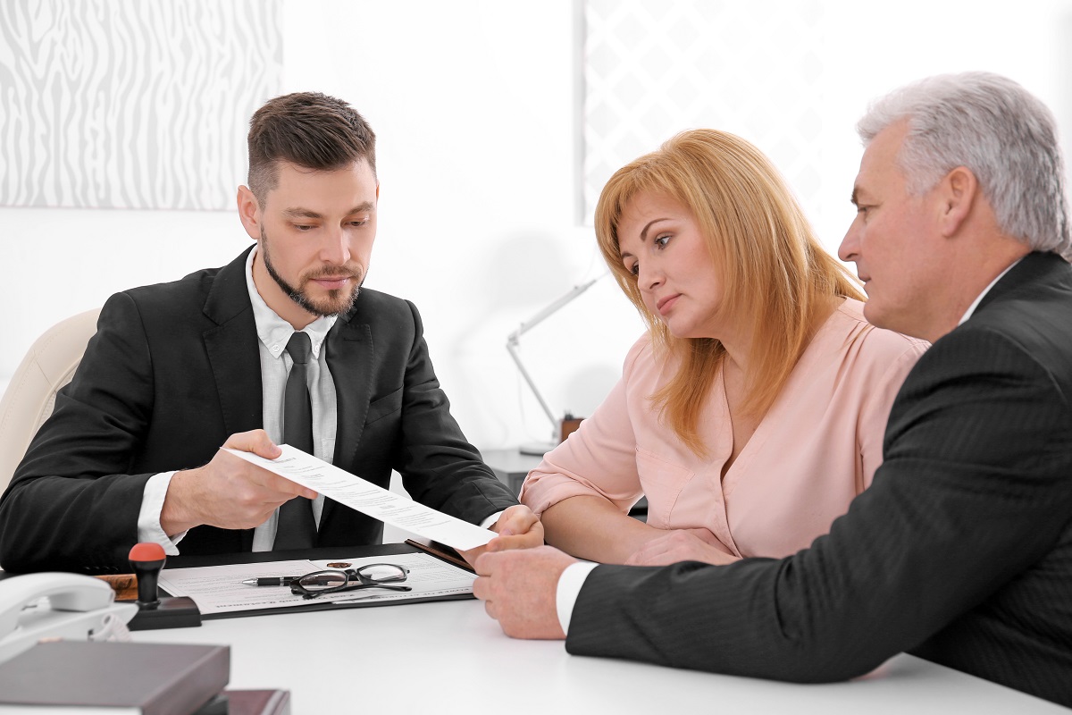 couple talking to agent