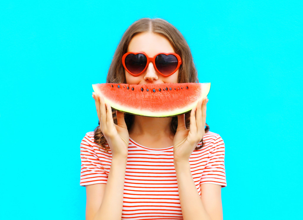 girl with a watermelon slice