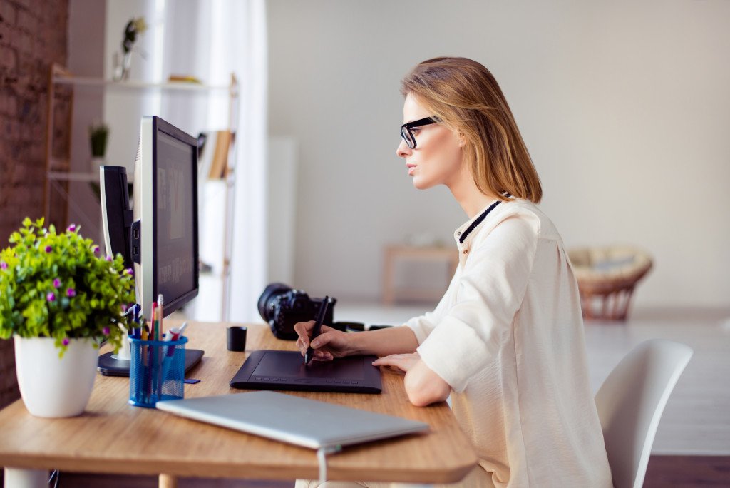woman graphic designer working on computer