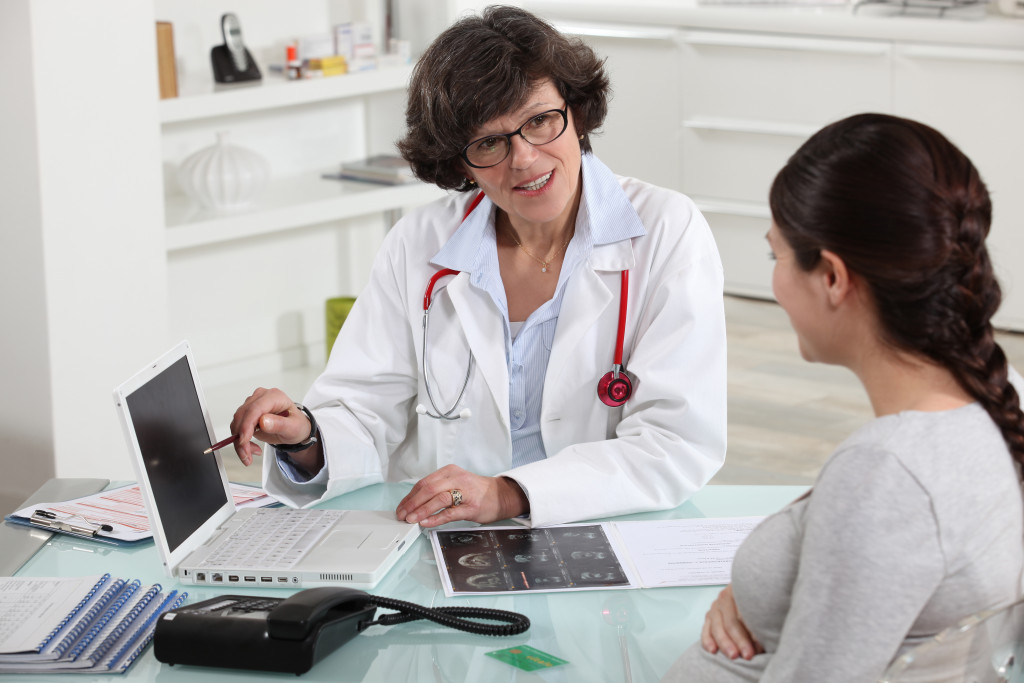 doctor showing an accurate results of the test that was done to the patient