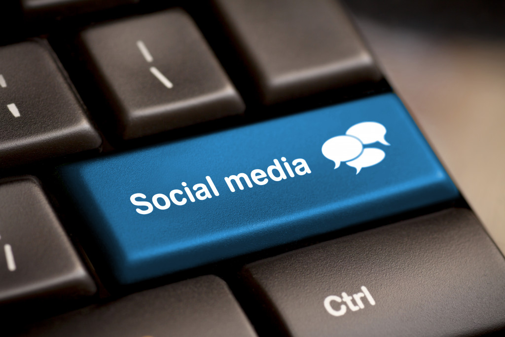 A blue social media button on a keyboard