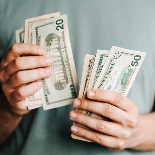 man counting his money