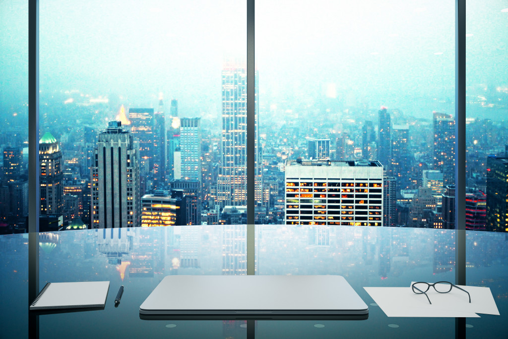 modern office with beautiful city view t nighttime 