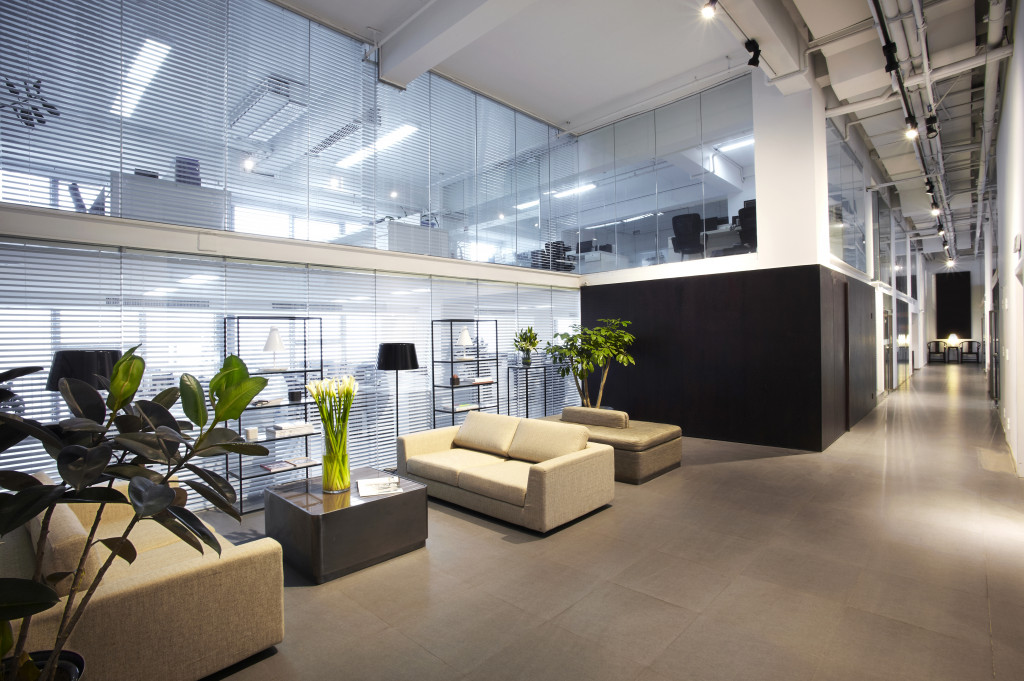 modern office with common seating area in the hallway and ambient lighting