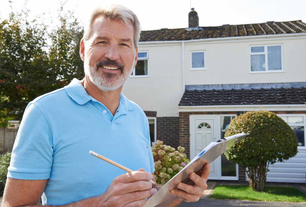 man in light blue shirt smiling