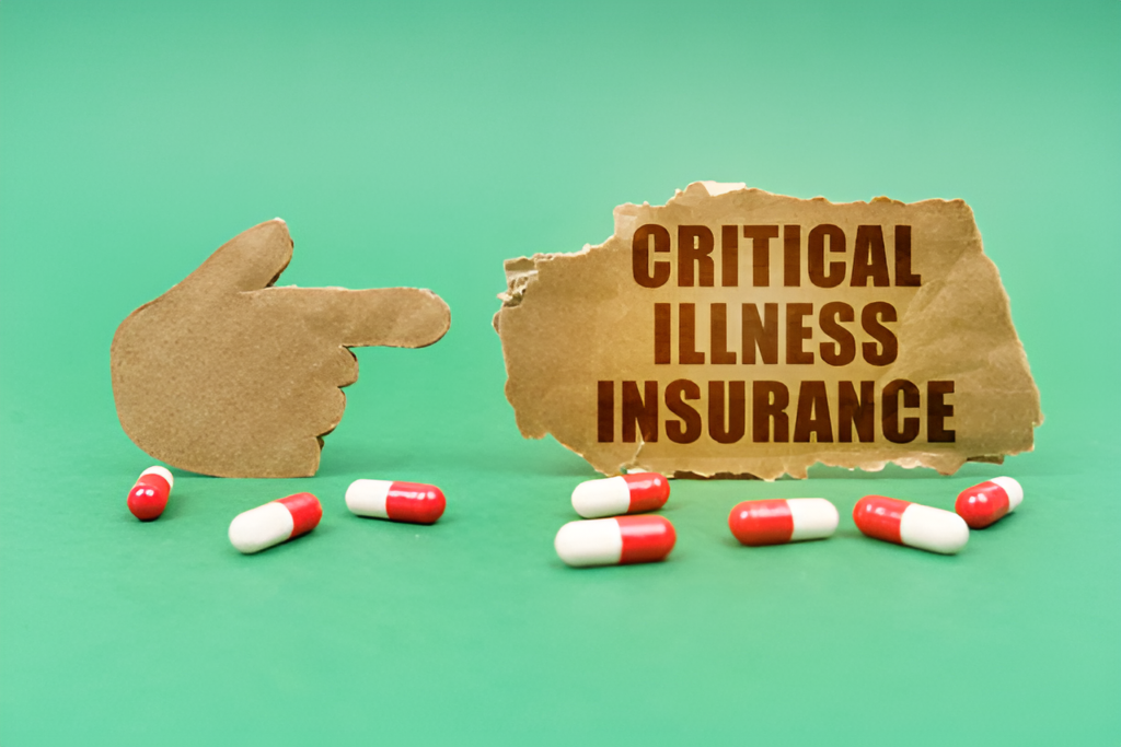 torn paper with the words 'critical illness insurance' and scattered pills