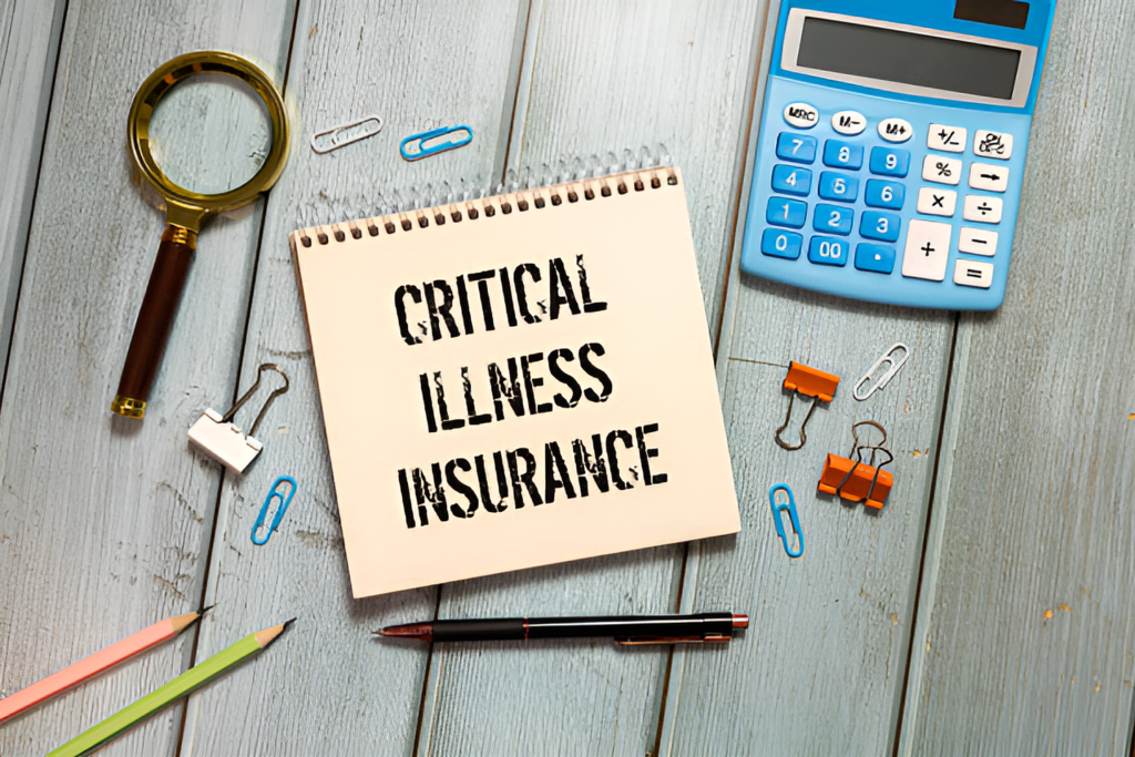 a calculator, a magnifying glass, paper clips, and a notepad with the words 'critical illness insurance' written on it